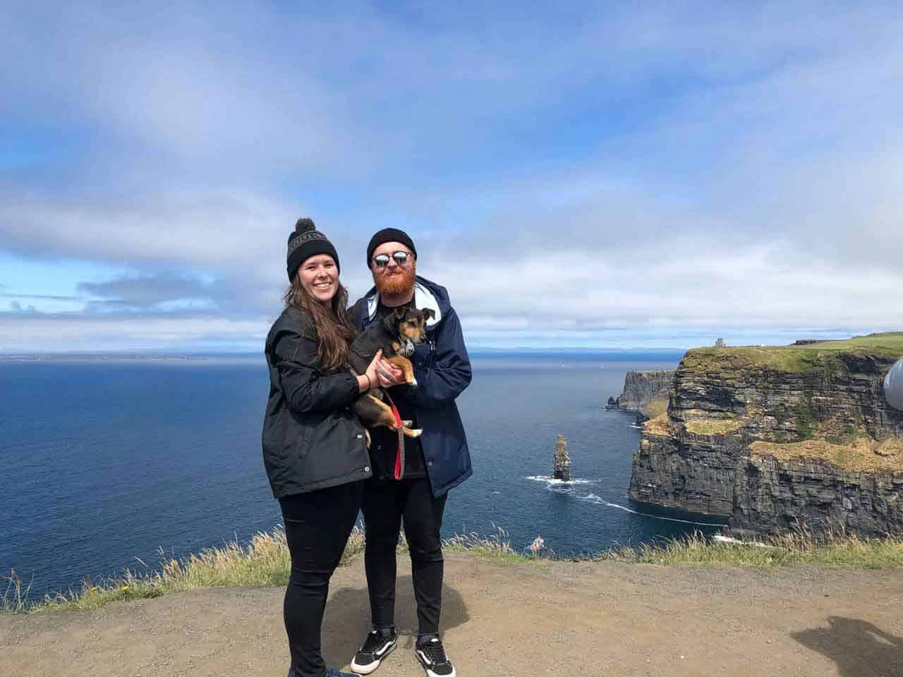 Two tourists on the Cliffs with dog Moby
