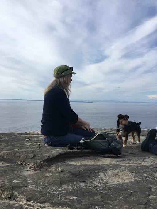Woman on the Cliffs with dog Moby